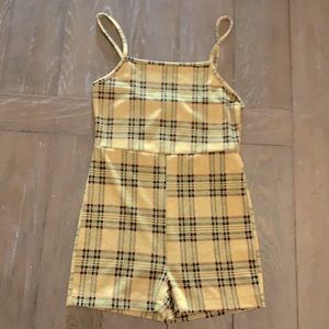 I am selling a store brand jump suit with spaghetti straps and low cut shorts